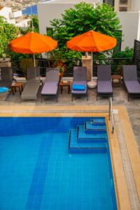Outdoor Pool with a Seating Area: Design Ideas & Layout Guide