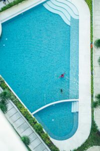 Curved Outdoor Pool Design Ideas for Modern & Luxury Backyards