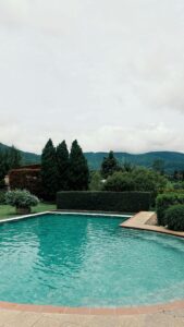 Semi-Inground Outdoor Pools: Cost, Ideas & Pros