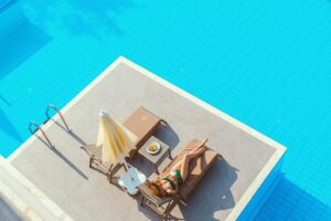 Outdoor Pool with a Tanning Ledge: Design & Benefits